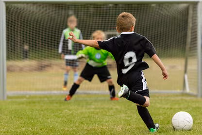 Kids playing soccer